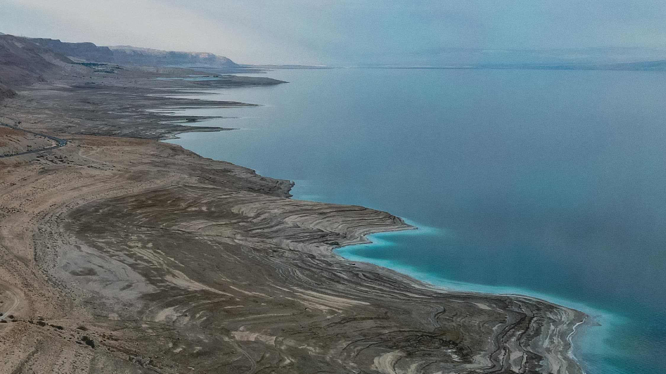 Floating in the Dead Sea, the lowest point on Earth