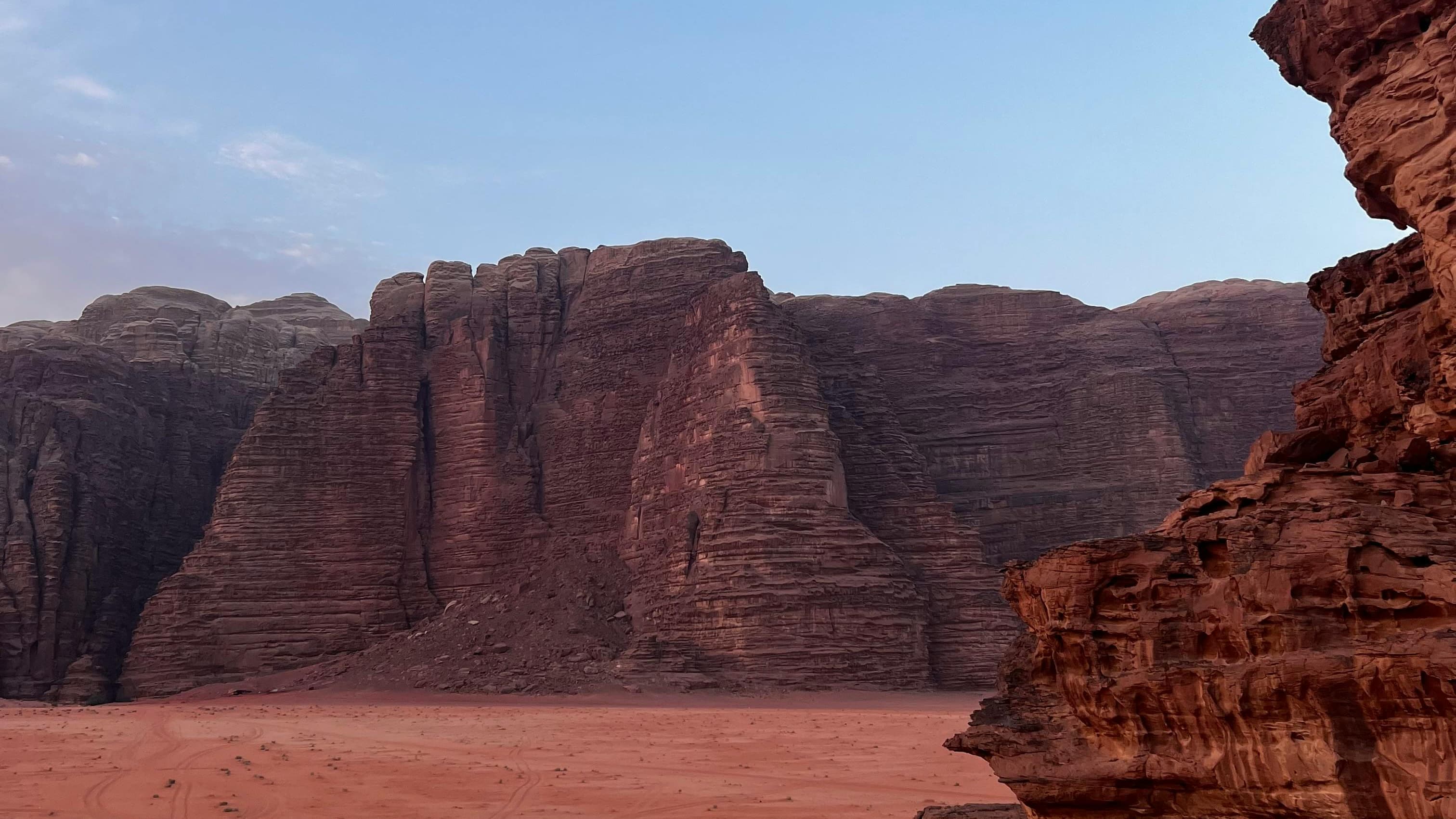 Wadi Rum desert landscape with sandstone cliffs and red sand